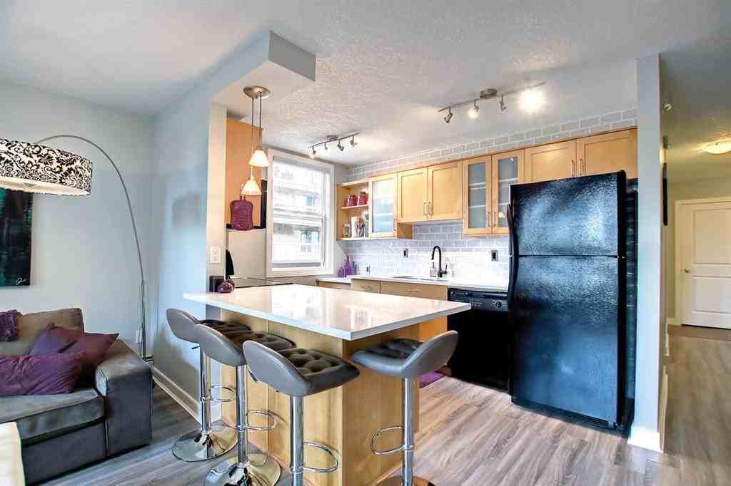 605 14 Ave Sw - Photo 2 of 22