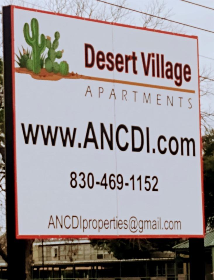 Desert Village Apartments - Photo 2 of 31