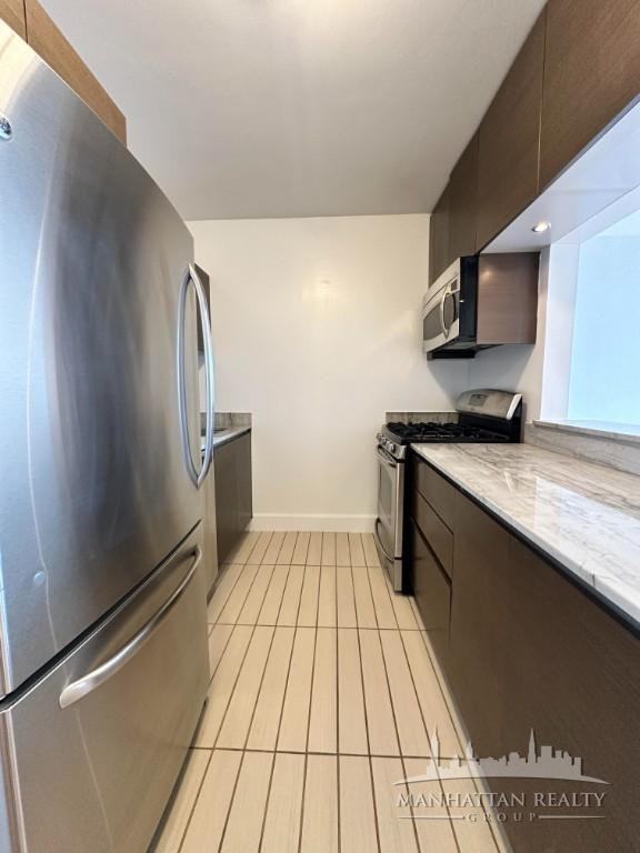 W 48th St #26 - Photo 2 of 13