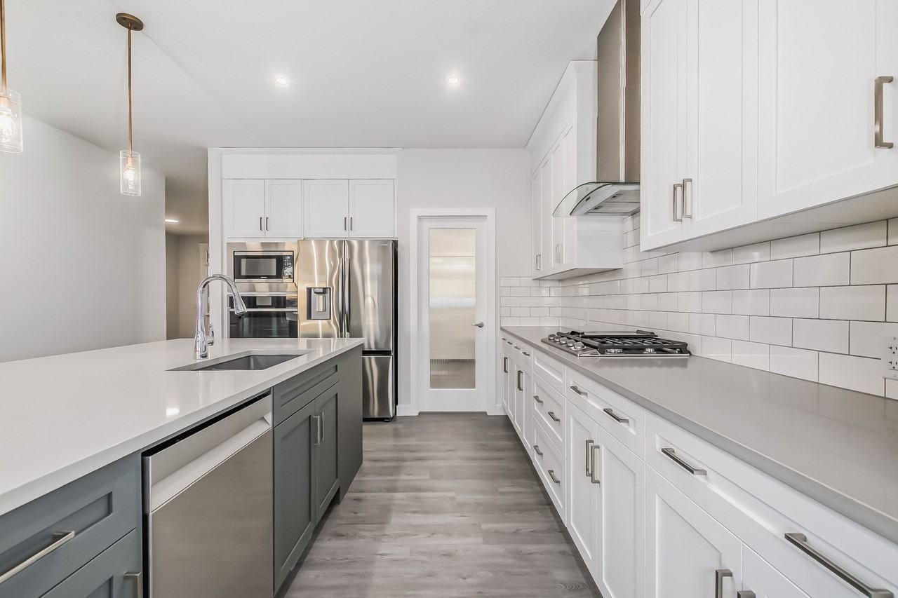 2156 Ravensdun Crescent Southeast - Photo 2 of 47