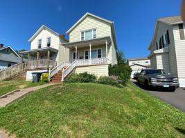 featured image of 15 E 8th St