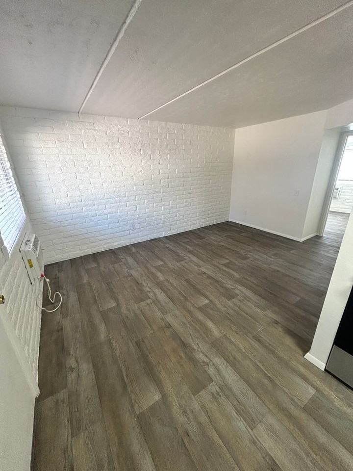 1250 E 10TH ST - Photo 4 of 22