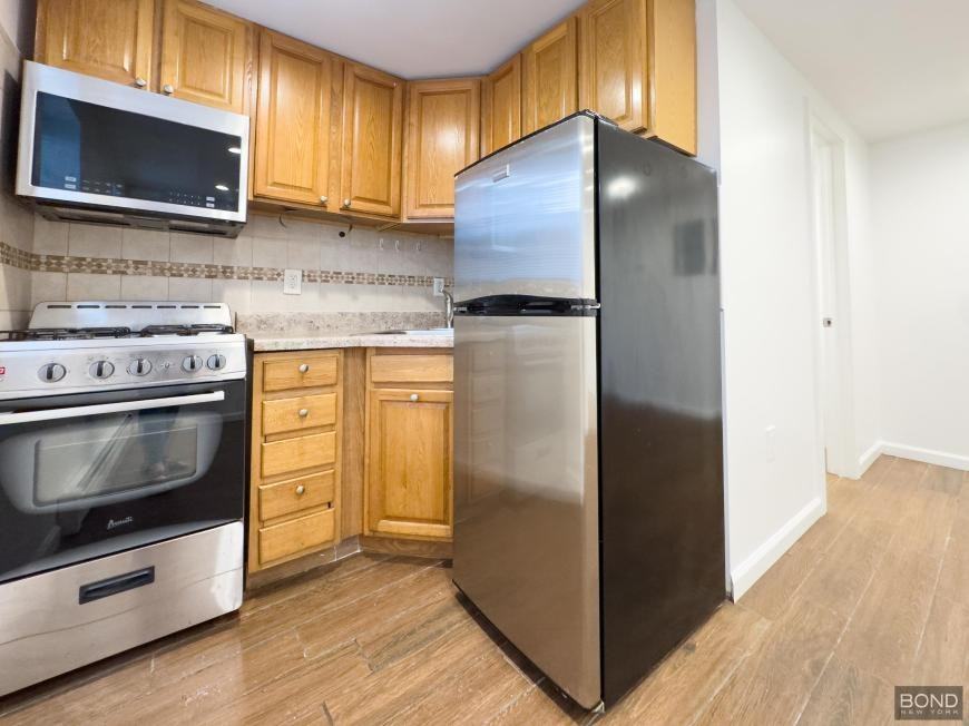 9710 Rockaway Beach Blvd - Photo 2 of 6