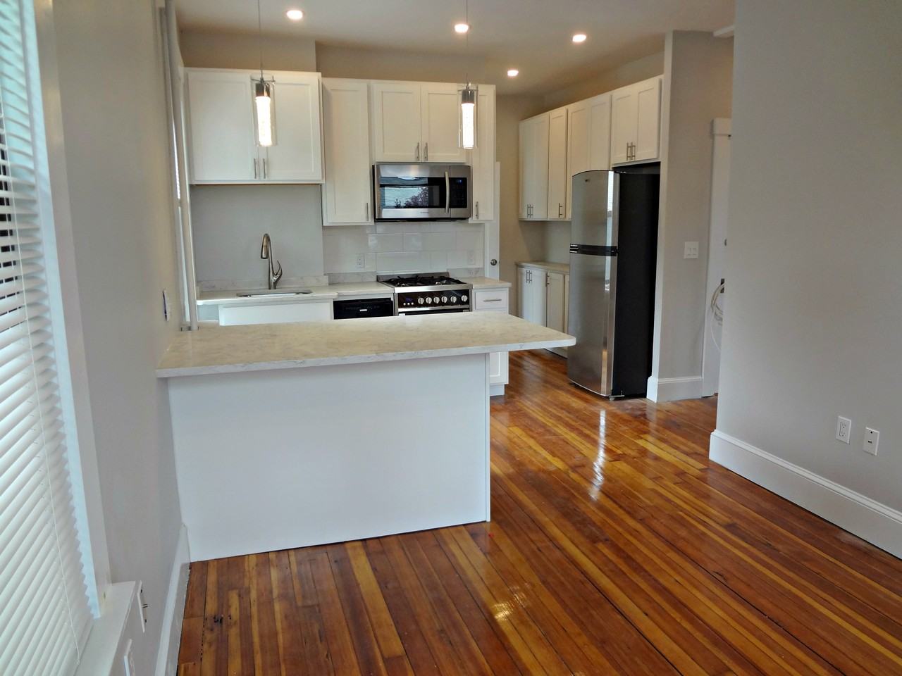 15, 17, 19 Seaverns Ave - Photo 4 of 40
