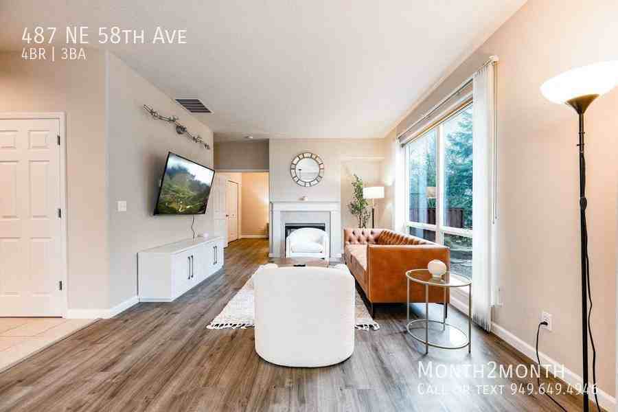 487 Ne 58th Ave - Photo 4 of 26