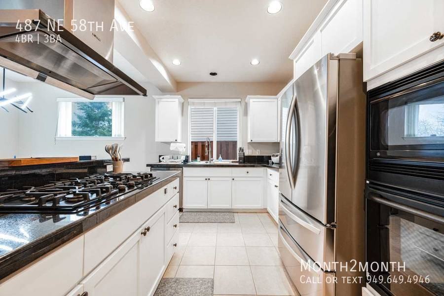 487 Ne 58th Ave - Photo 7 of 26