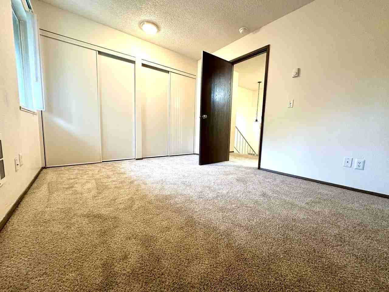 The Shadows Townhomes - Photo 3 of 5