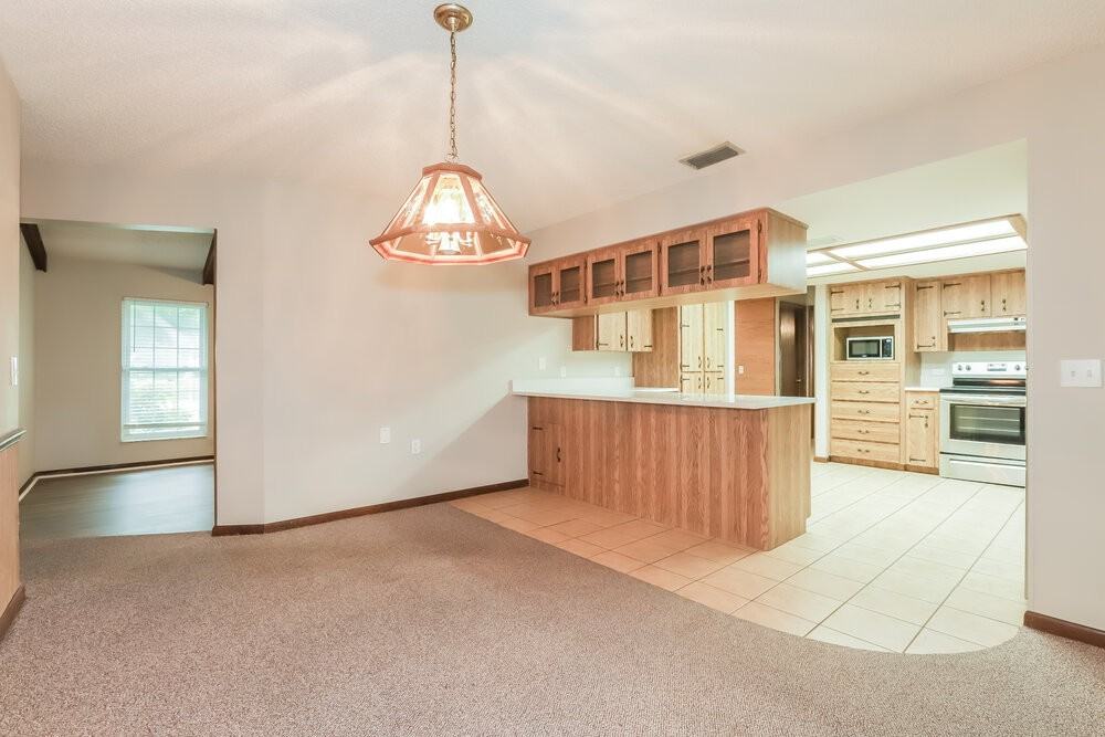 7606 Mather Rd N - Photo 6 of 16