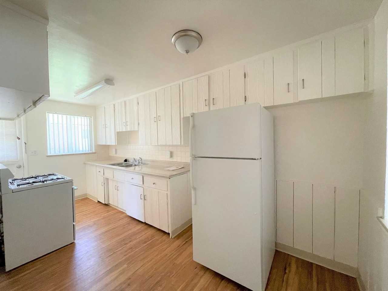 The Village Green Apartments - Photo 2 of 4