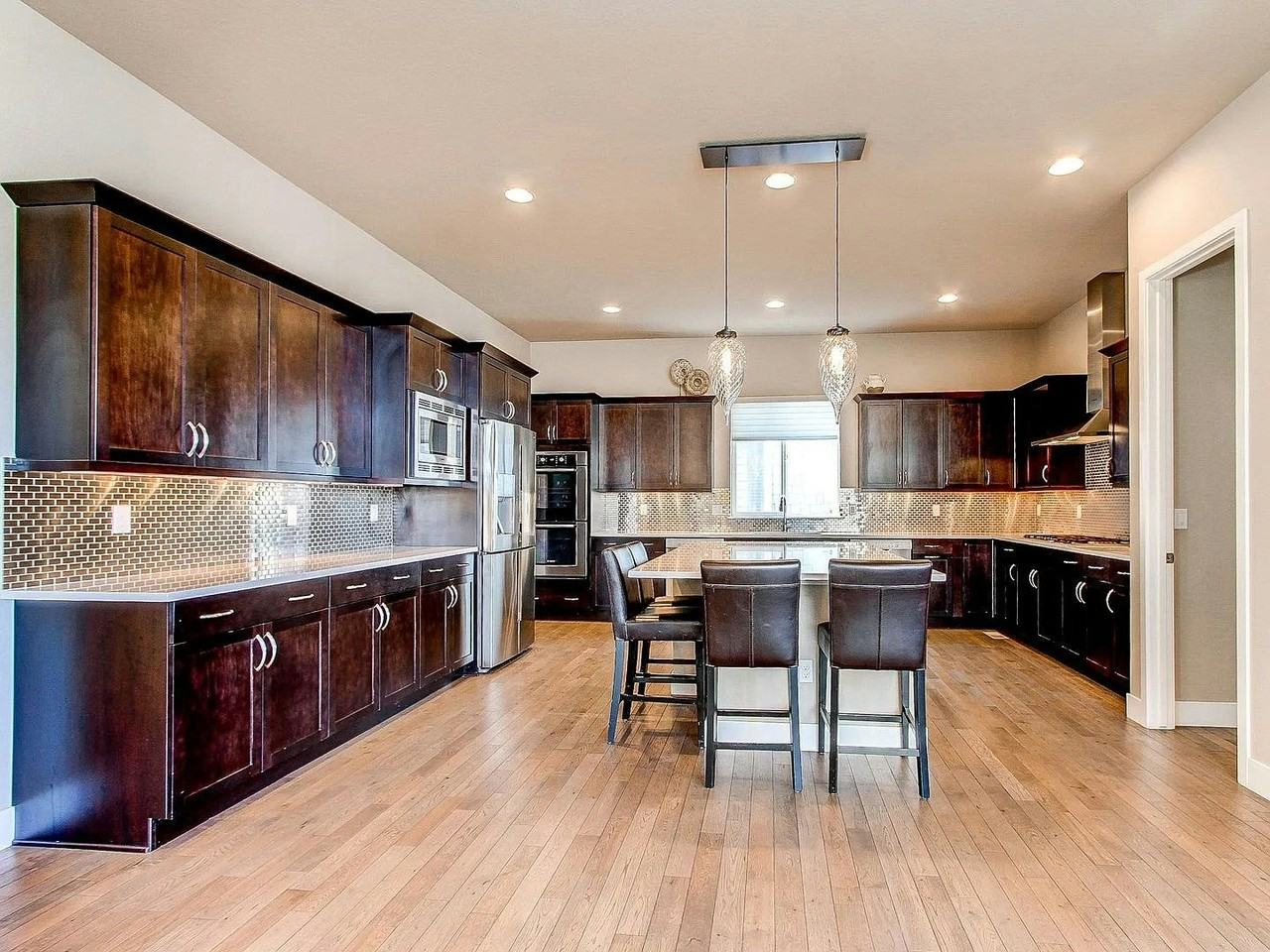 8374 East 51st Avenue - Photo 7 of 50