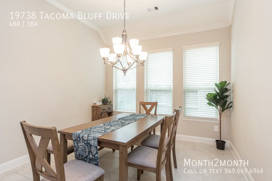 19738 Tacoma Bluff Dr - Photo 3 of 26