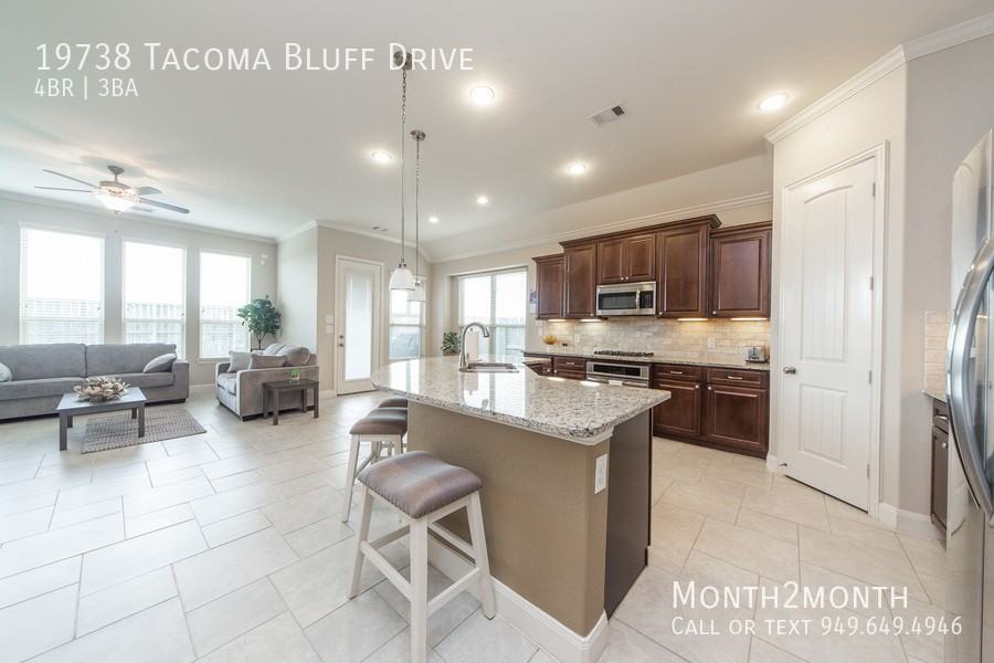 19738 Tacoma Bluff Dr - Photo 4 of 26