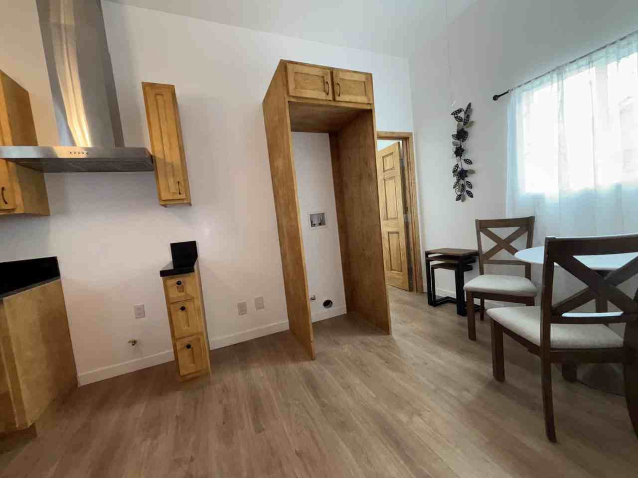 E 103rd St - Photo 2 of 4