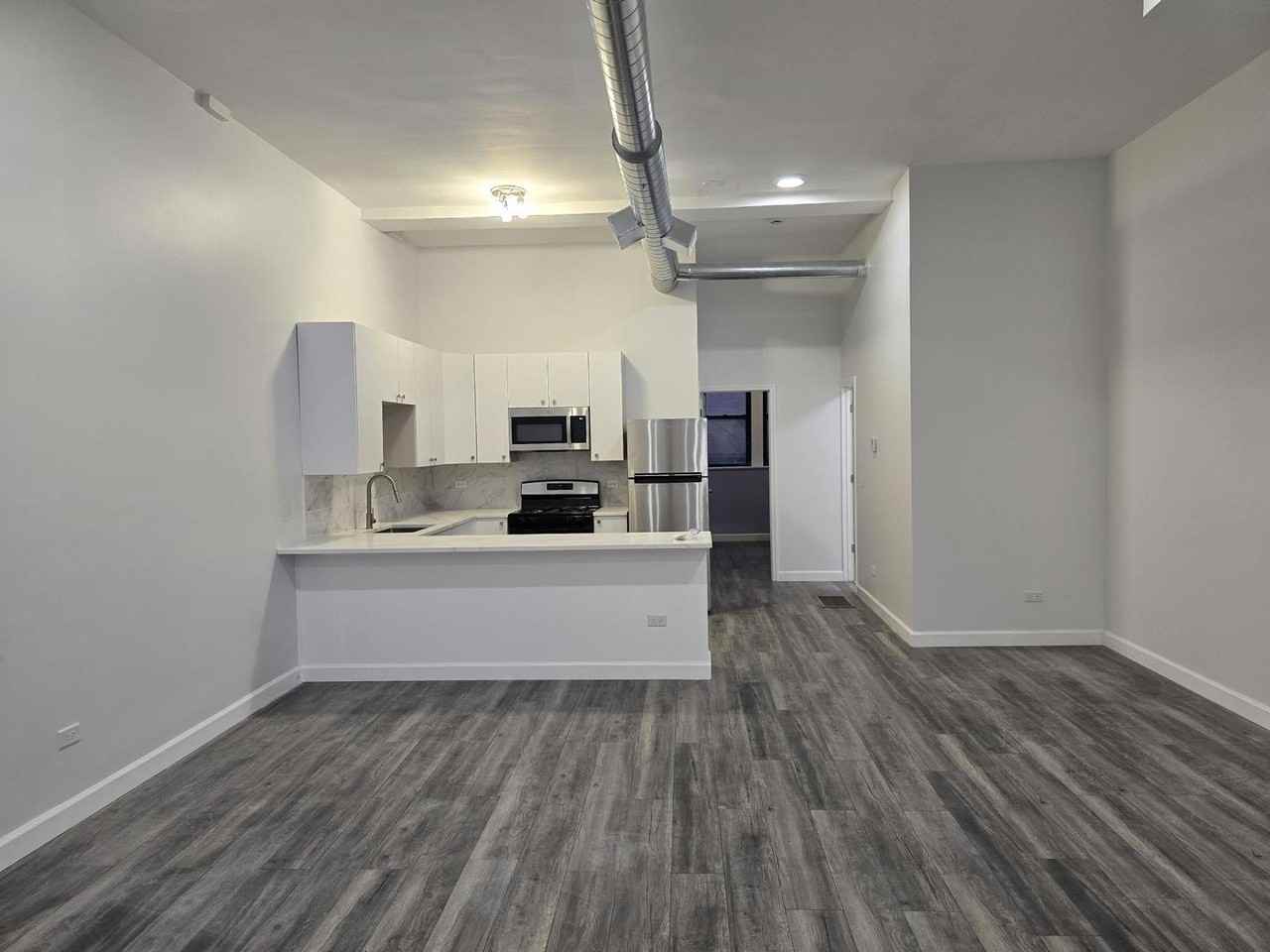 6406 N Mozart St ##1 - Photo 3 of 7