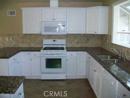 9711 Penfield Ave - Photo 2 of 4