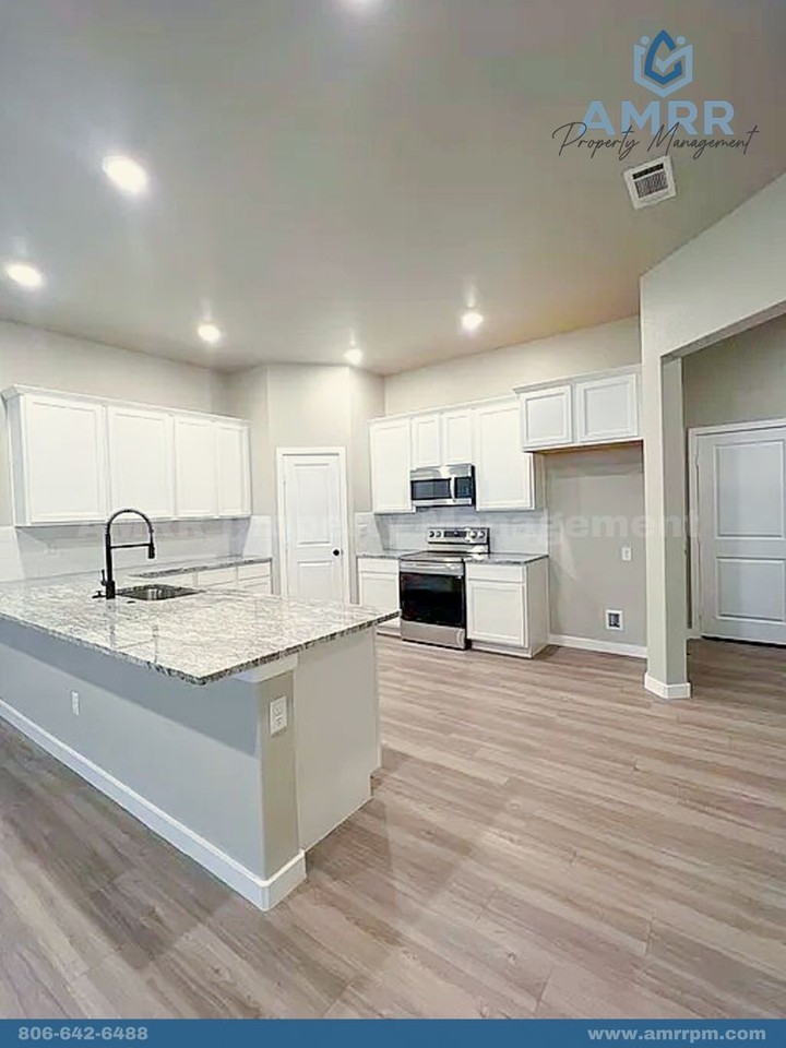 7318 E County Road 99 1/2 - Photo 4 of 18
