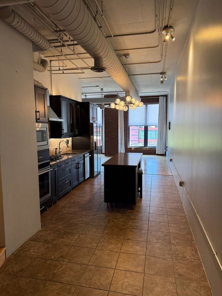 21 E 6th St - Photo 2 of 16
