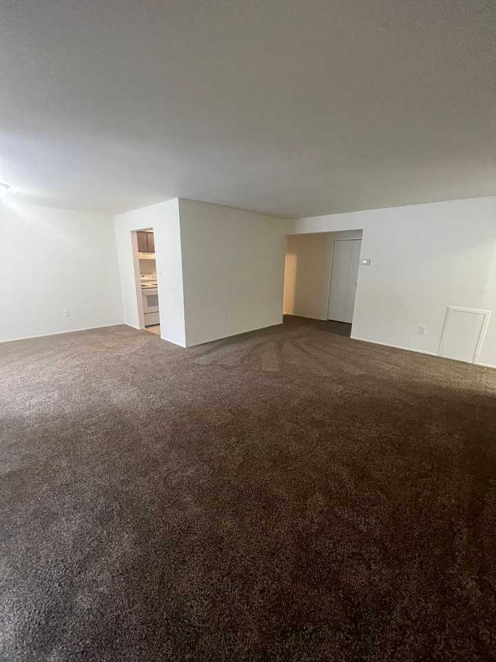 WOODHUES APARTMENTS - Photo 7 of 50