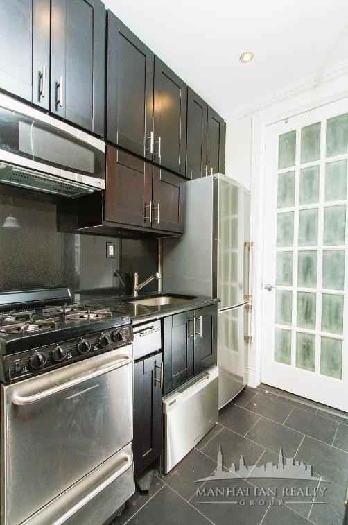 E 3rd St #3 - Photo 2 of 8