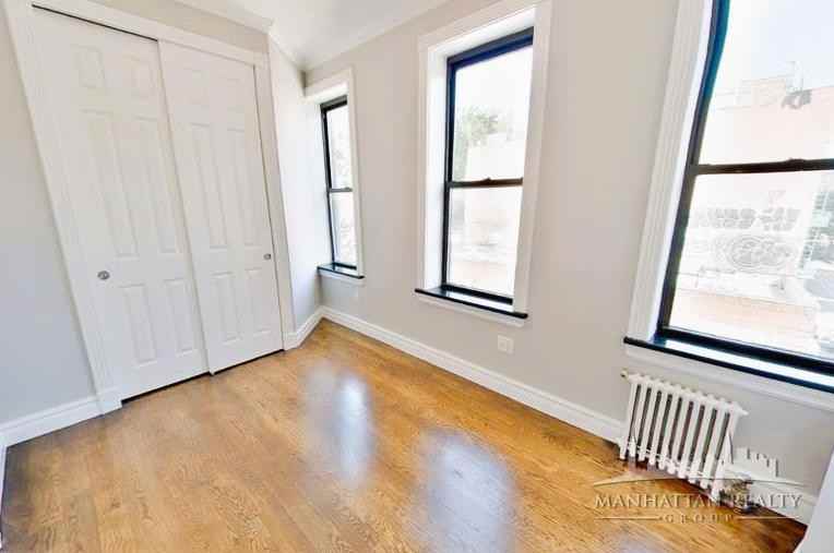 E 3rd St #3 - Photo 3 of 8