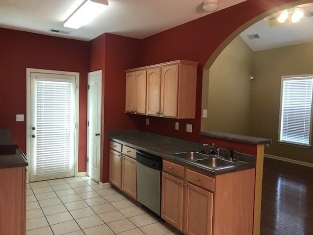 9085 Chimneyrock Blvd - Photo 4 of 11