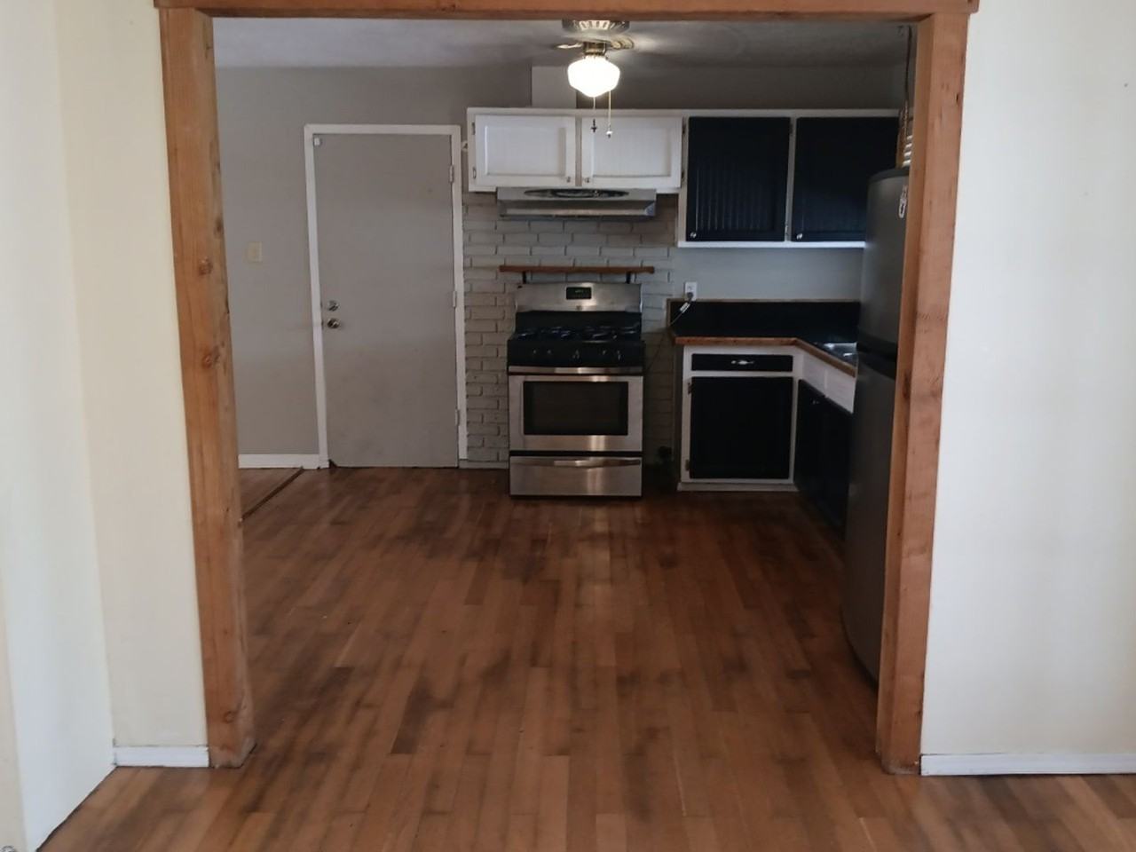 7901 Hannett Ave Ne - Photo 2 of 6