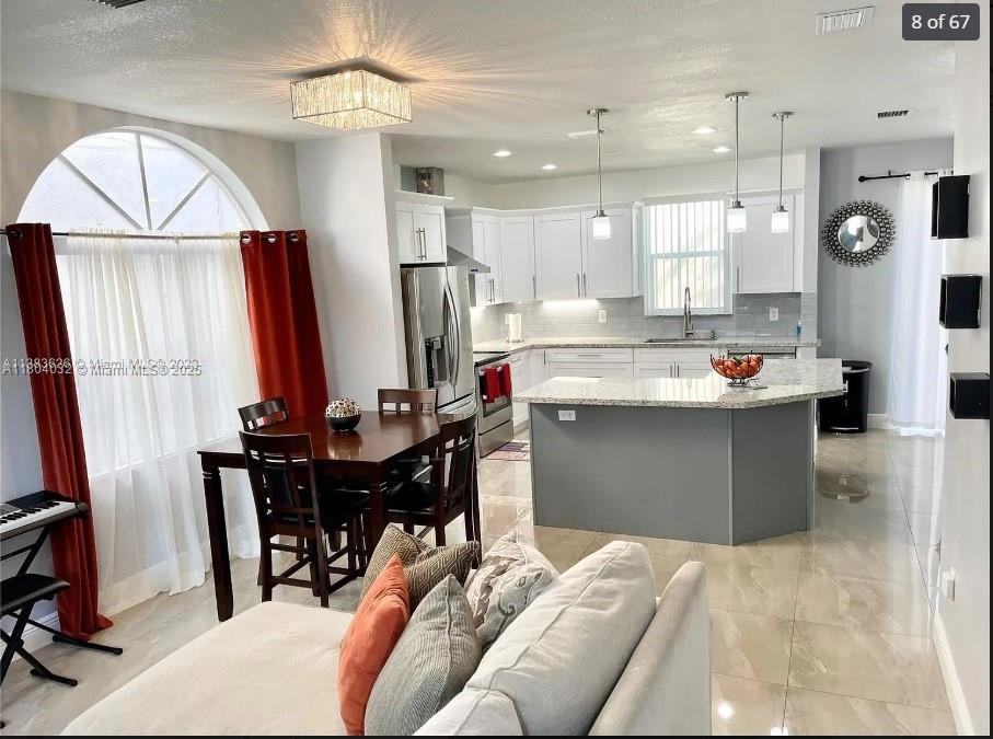 409 Nw 87th Ln - Photo 5 of 8