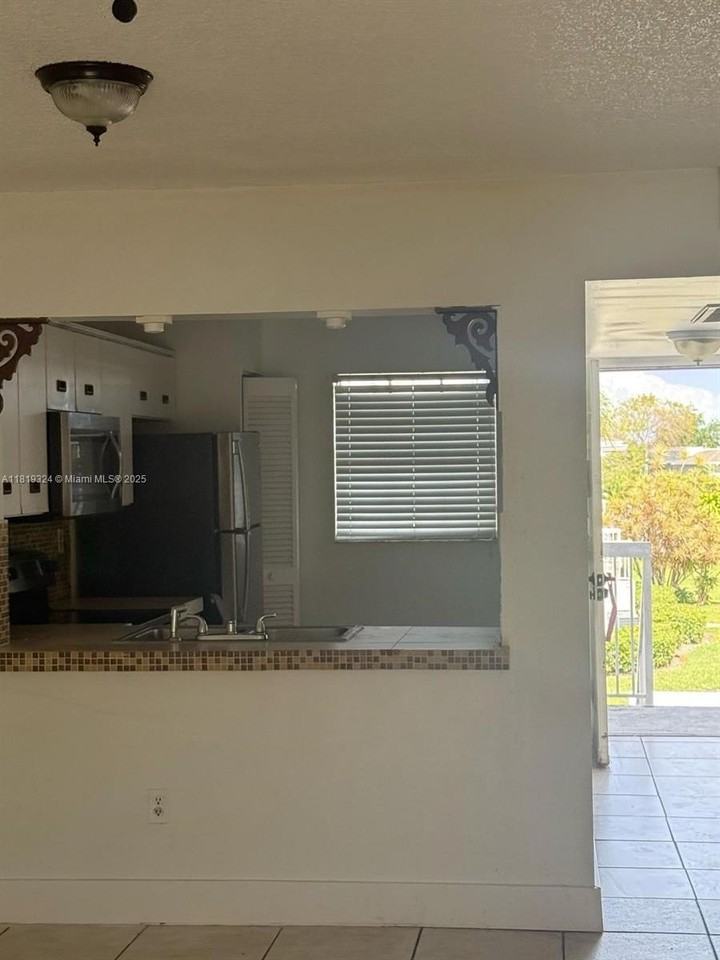 438 Ne 210th Circle Ter #202-4B - Photo 4 of 14