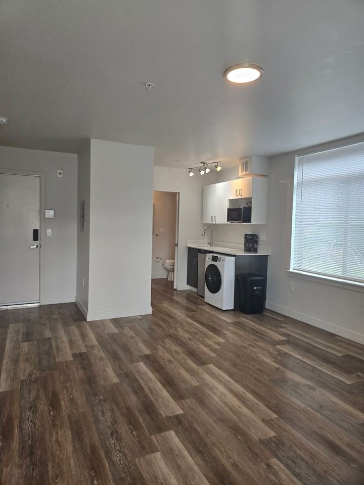 Experience Luxury Living at Bode 125: Modern Apartments with Top - Photo 3 of 50