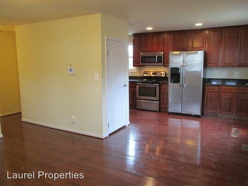 8032 Woodholme Cir - Photo 2 of 21