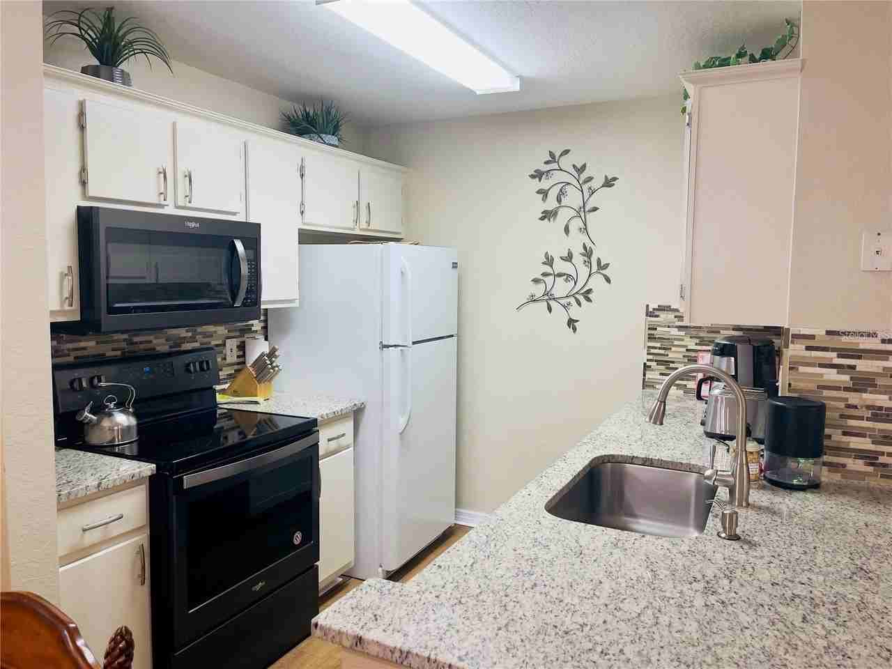 8815 Manor Loop #104 - Photo 6 of 23