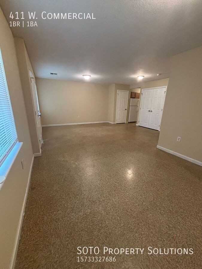 411 W Commercial St - Photo 2 of 6