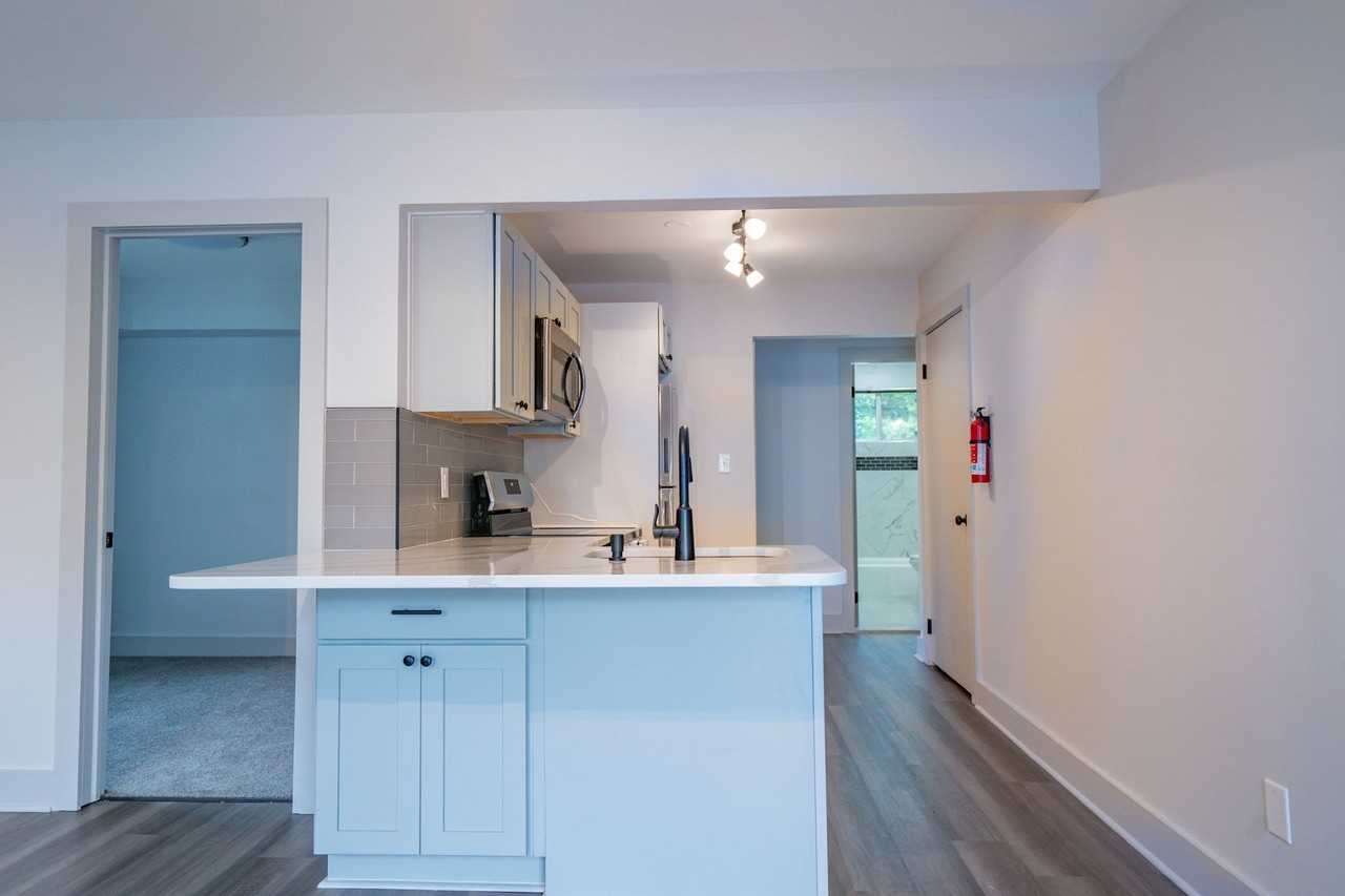 West Gate Apartments - Photo 4 of 14