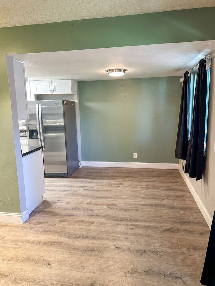 1205 S Wheeling Way - Photo 3 of 17