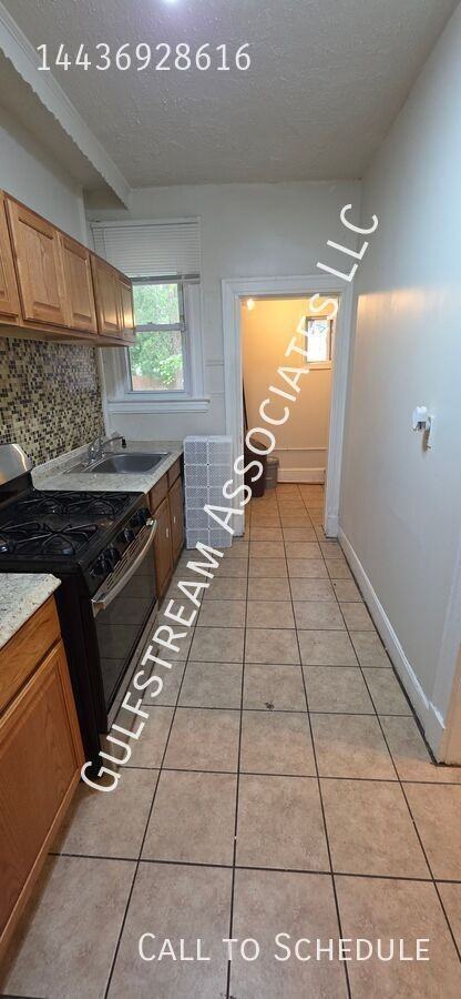 3903 Gwynn Oak Ave - Photo 3 of 19