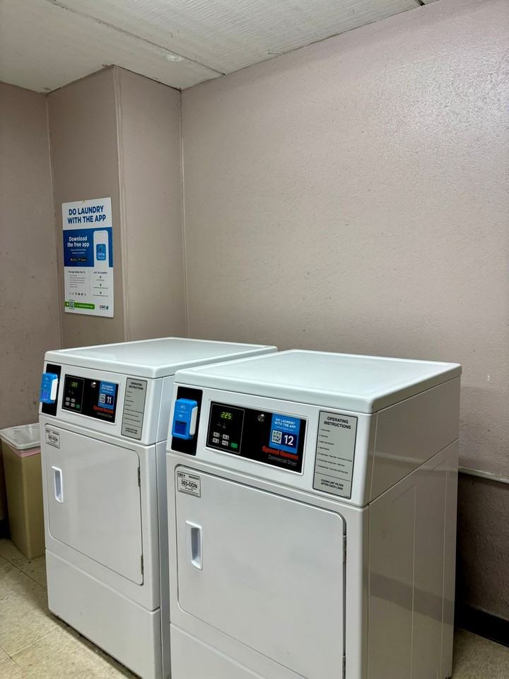 TRIAD APARTMENTS - Photo 2 of 2