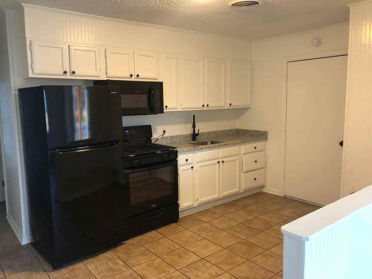 216 E 4th St - Photo 7 of 8