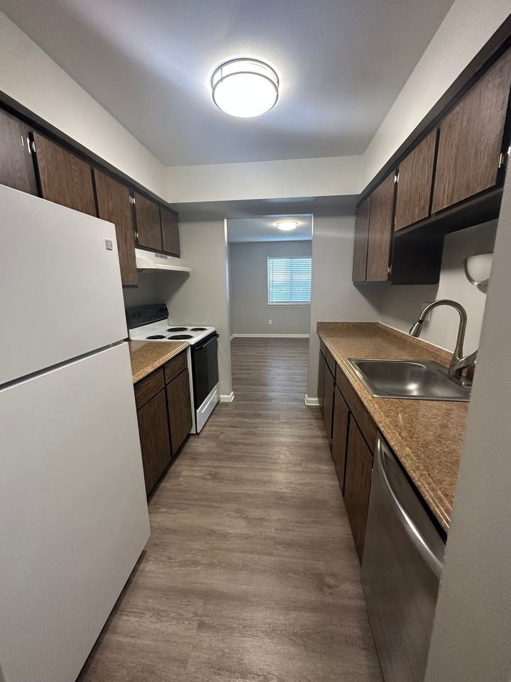 WOODHUES APARTMENTS - Photo 3 of 50