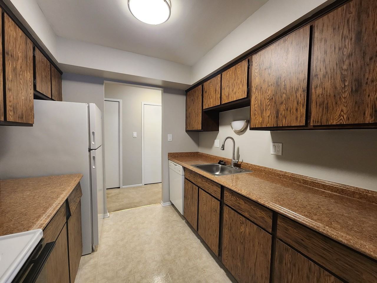 WOODHUES APARTMENTS - Photo 4 of 50
