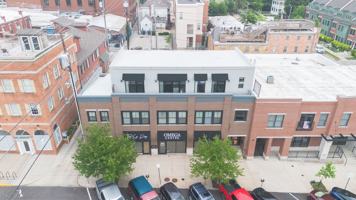 featured image of 115 E 6th St