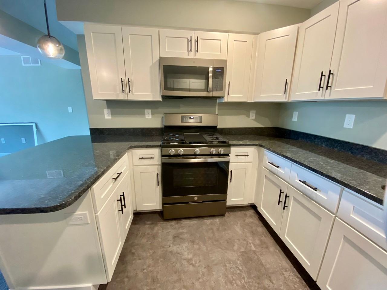 875 Houseman #1-12 - Photo 3 of 50