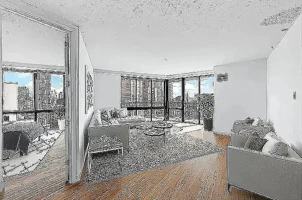 featured image of E 57th St #12A