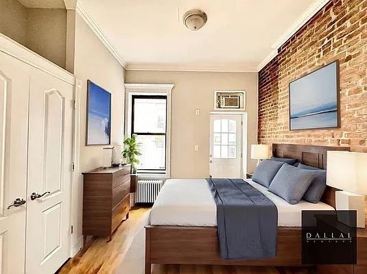 E 6th St #2A - Photo 2 of 3