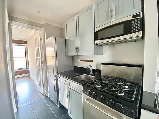 E 13th St #33 - Photo 3 of 5