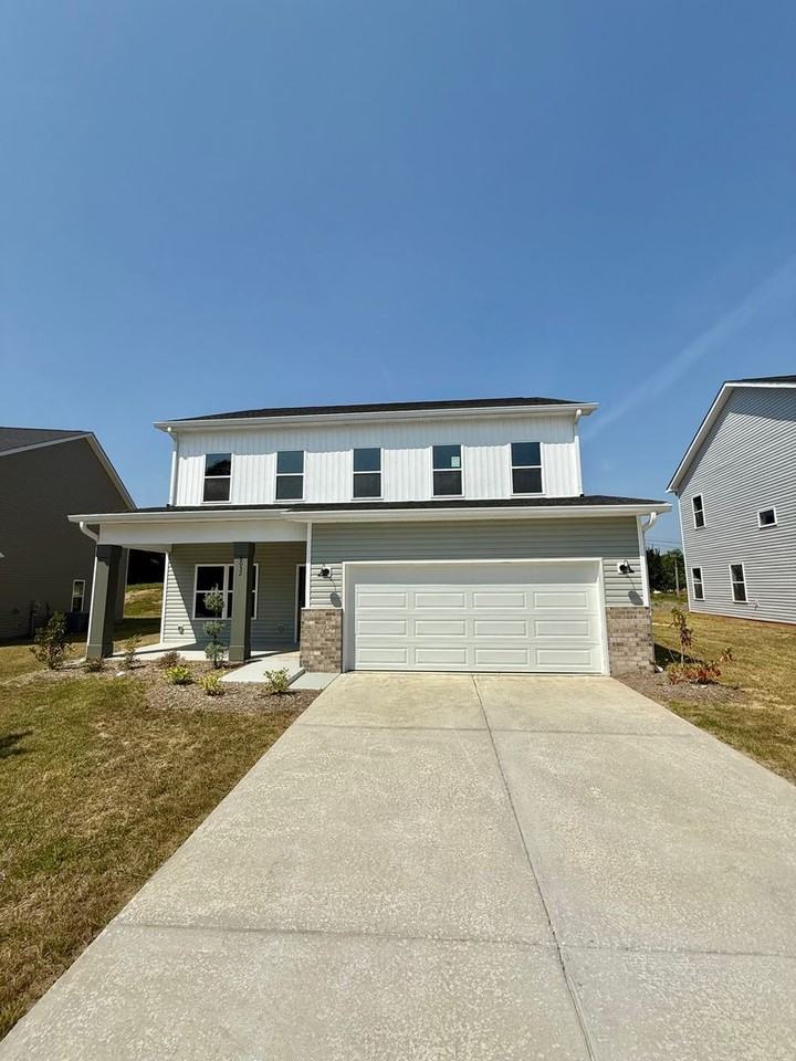 Joy Homes - Photo 3 of 20