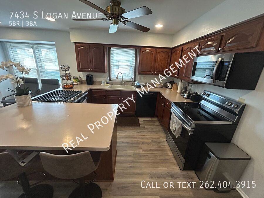 7434 S Logan Ave - Photo 2 of 32