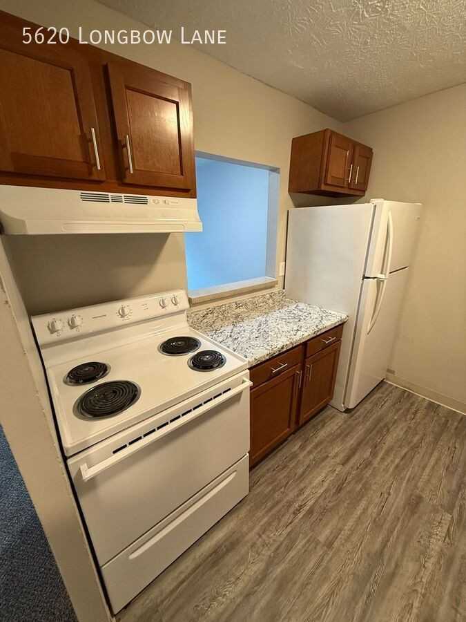 5620 Longbow Ln - Photo 3 of 12