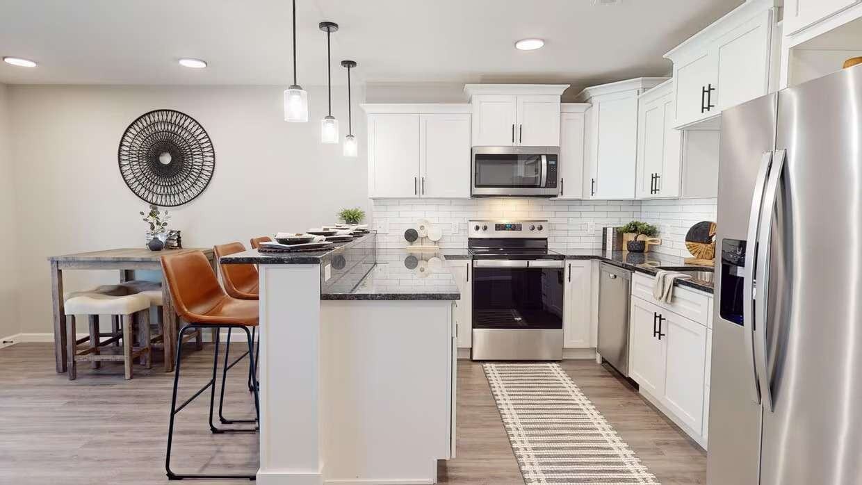 The Woods Townhomes - Photo 4 of 32