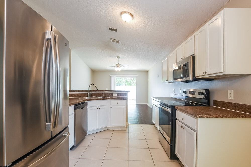 13825 Econ Woods Ln - Photo 7 of 16
