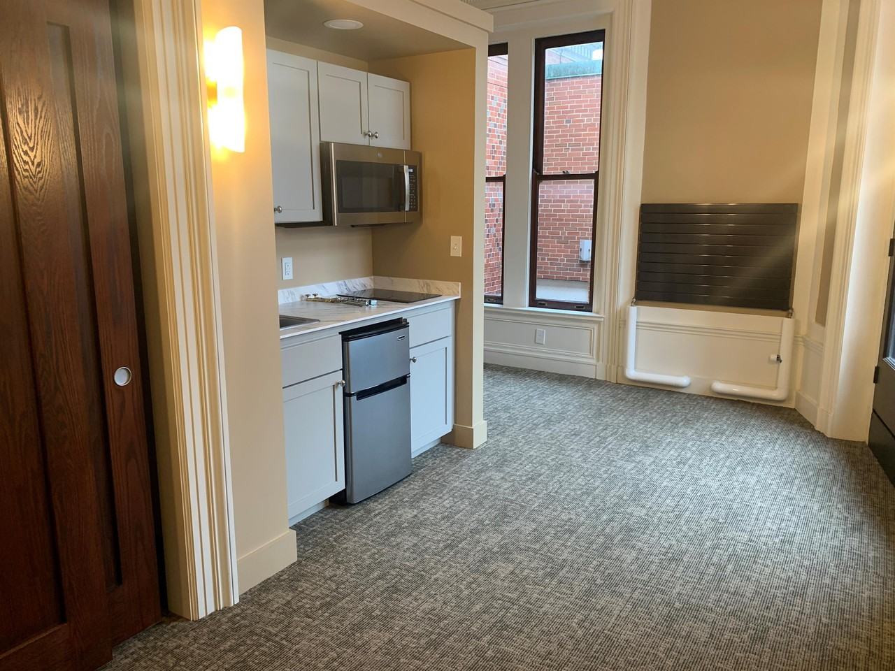 The Goodyear Mansion & Residences - Photo 4 of 33